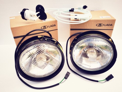 2x Scheinwerfer + Leuchtweitenregulierung